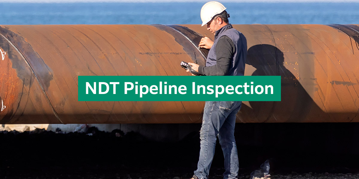 Worker using non-destructive testing to conduct a pipeline inspection